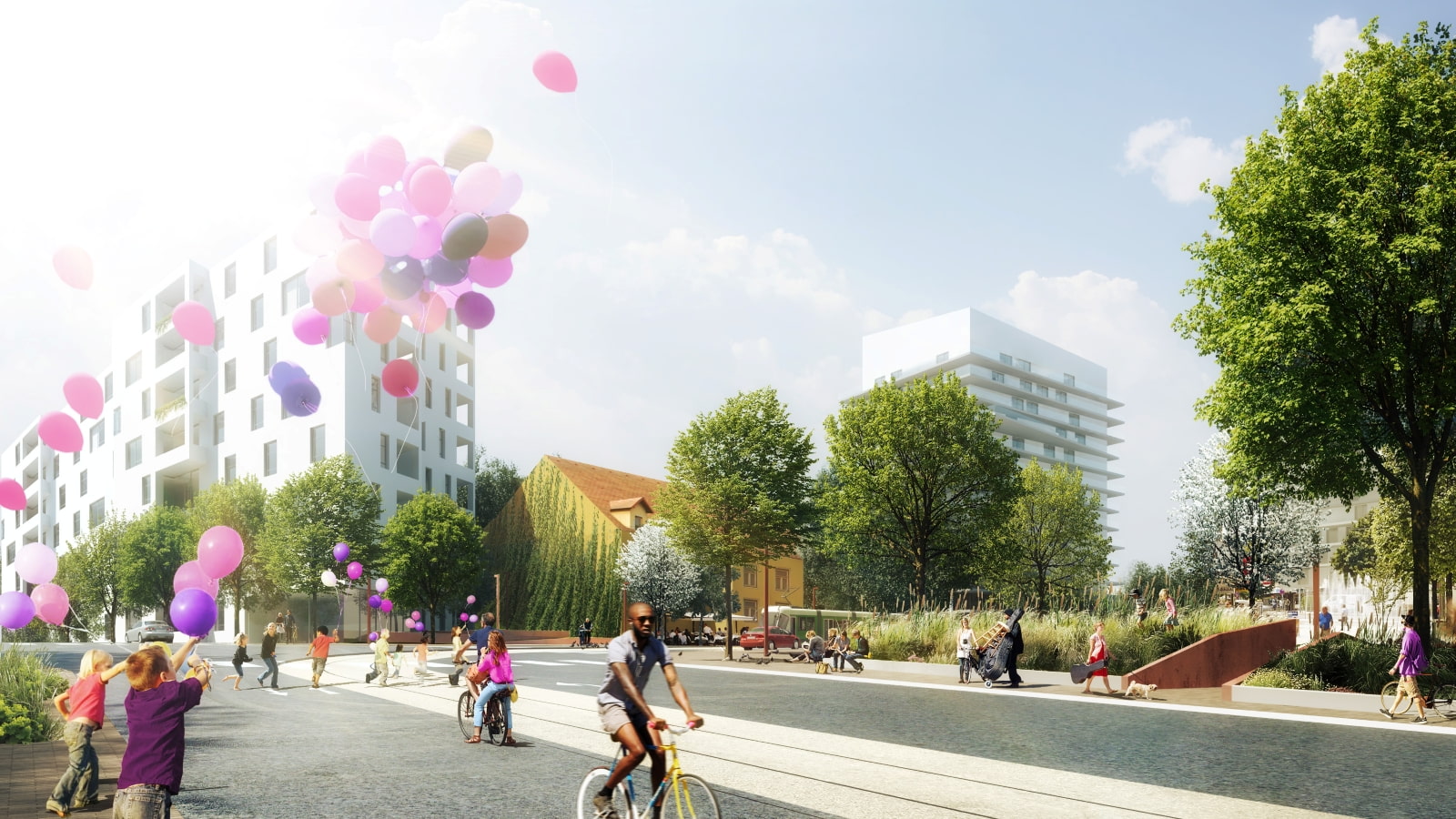 Städtischer Platz mit Menschen, die Rad fahren, spazieren und bunte Ballons steigen lassen. Moderne Wohnhäuser und viel Grün prägen die Umgebung.