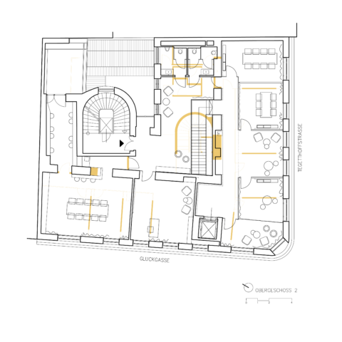 Grundriss des zweiten Obergeschosses. Der Plan zeigt Büroräume mit mehreren Arbeitsplätzen, Besprechungsräume, Aufenthaltsbereiche sowie die zentrale Treppe.