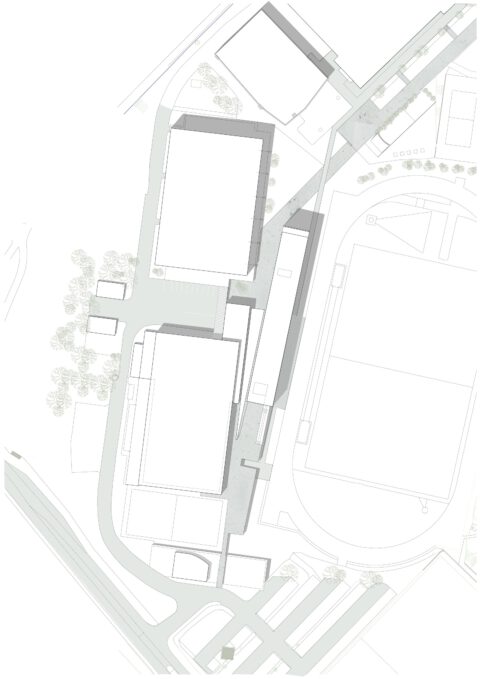 Lageplan eines modernen Sportzentrums mit mehreren Gebäuden, Wegen, Grünflächen und Zufahrten, übersichtlich in Draufsicht dargestellt.