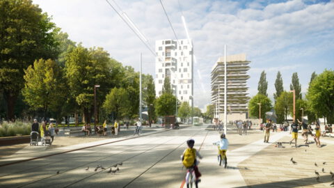 Belebter Stadtplatz mit Bäumen, Radfahrern, Fußgängern und modernen Hochhäusern im Hintergrund, gestaltet als urbaner öffentlicher Raum.