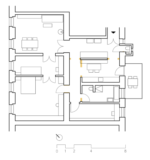 Grundriss einer Wohnung mit markierten Bereichen für Möbeleinbauten. Der Plan zeigt eine klare Aufteilung von Wohn-, Schlaf- und Essbereichen sowie funktionale Zonen für Küche und Bad.